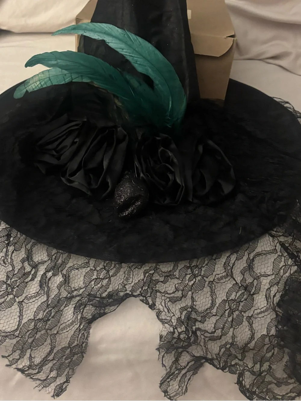 Black Witch Hat with Green Feather Accent